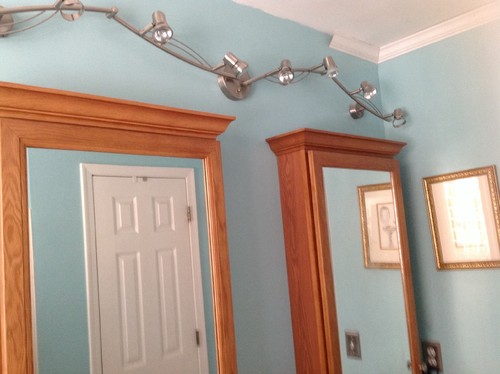 Lighting over surface mounted medicine cabinet